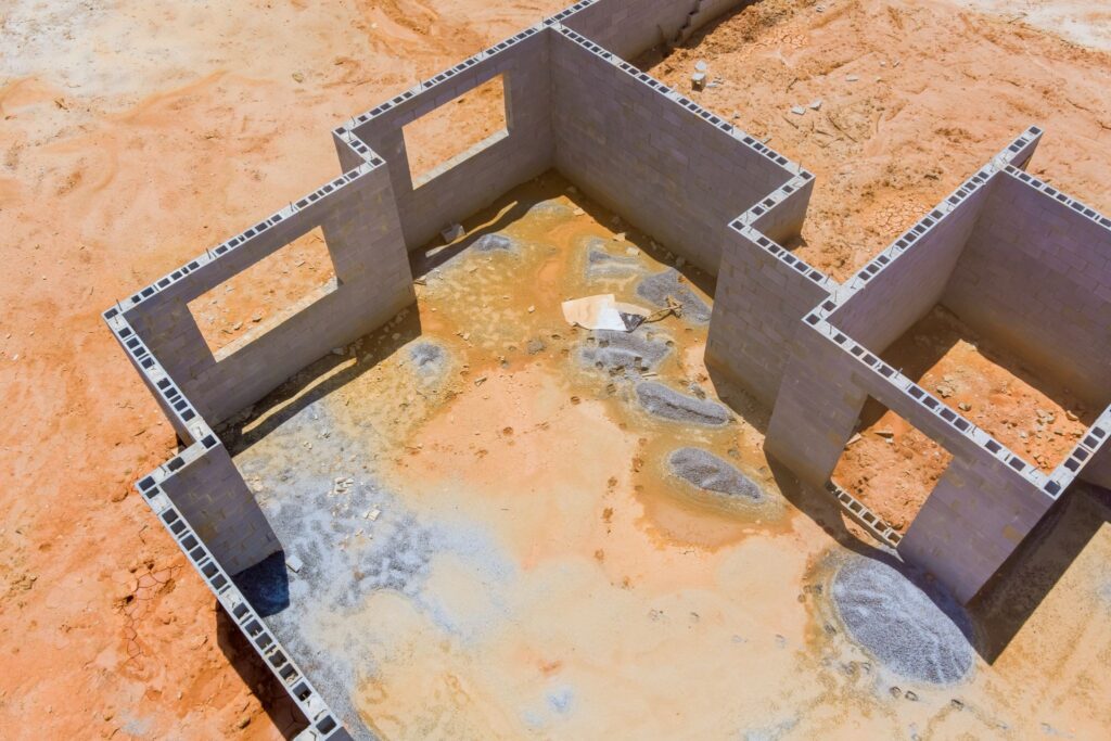 Foundation prep before selling your home, with concrete block walls forming the base structure